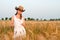 Girl in wheat field