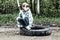 Girl on a wheel in a puddle