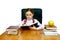 Girl which reads a book at the writing table