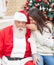 Girl Whispering Wish In Santa Claus\'s Ear