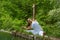 Girl in white doing yoga