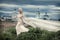 Girl in white dress on background of the Church