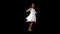 Girl in white dress twirling on black background