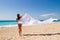 Girl With White sarong on The Beach.