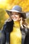 Girl white toothed smile, young happy woman whitened teeth in grey hat in autumn in the park