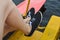 The girl woman twists her feet on the pedals of a catamaran swimming sport facility for relaxing walks on the lake river sea water