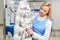 Girl worker performs dry Laundry, hand cleaning fur garments