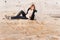 Girl Writing New Year in Sand