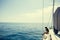 Girl yachting with smartphone photograph cruise