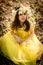 Girl in yellow princess dress