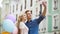 Girlfriend and boyfriend hugging in street and taking selfie, romantic photos