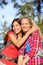 Girlfriends - happy young women hiking portrait