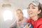 Girlfriends traveling by plane together, air flight passengers