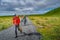 Girls as tourists going for ice walking tour equipped with safety gears, crampons and helmets at Skaftafellsjokull glacier, a