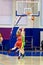 Girls athlete in sport uniform playing basketball