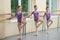 Girls ballet dancers rehearse in ballet class.