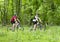Girls biking in the forest