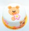 Girls birthday cake with a fondant teddy bear