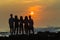 Girls Boys Silhouetted Beach Sunrise Ocean