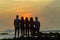 Girls Boys Silhouetted Beach Sunrise Ocean