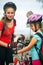 Girls children cycling Family pump up bicycle tire.