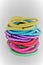 Girls colorful pony tail holders in a stack Isolated
