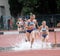 Girls compete in the 3.000 Meter Steeplechase