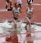 Girls compete in the 3.000 Meter Steeplechase