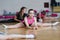 Girls dancer practicing stretching, young cheerleader doing acrobatic and flexible tricks, fitness, stretching workout, sport