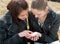 Girls examine lines on a palm