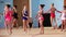 Girls gymnasts having training in gym before examination in Deriugina school