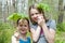 Girls holding May apples