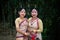 Girls isolated dressed in traditional wearing on festival with blurred background