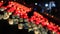 Girls light candles in traditional festival