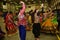 Girls, Man, women are performing garba and dandiya dance wearing traditional Indian folk dress during Navratri festival,Canada