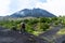 The girls observe the top of the Pacaya volcano in Guatemala.