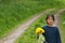 Girls picking up flowers