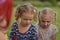 Girls play a game on a girl friends birthday. Paty for kids. Ukraine, Kiev, 18 june 2020.