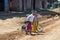 Girls playing with bikes, Laos