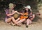 Girls playing Guitar and Djembe Outdoors