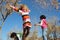 Girls playing in leaves