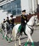 Girls - police cavalrymen demonstrate dressage on the Prospect Mira in Moscow.