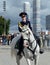 Girls - police cavalrymen demonstrate dressage on the Prospect Mira in Moscow.