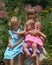 Girls posing in flower garden