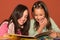 Girls reading book