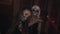 Girls with santa muerte face paint dancing and posing for camera at night club