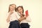 Girls school uniform take selfie smartphone. Posing to take perfect photo. Girlish leisure. Girls just want to have fun