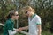 Girls shaking hands after tennis match