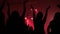 Girls silhouette on rock concert, cheering fans clapping with hands up, drunk girls partying