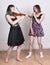 Girls singing and playing violin